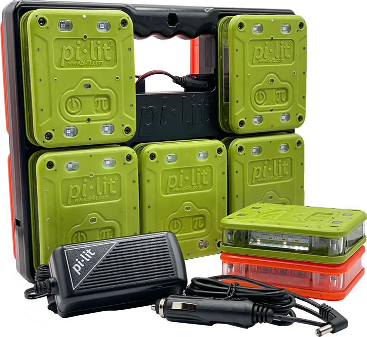 The Smart IR Med-Evac Landing Zone Kit: flares docked in the charging case, with the charger and vehicle charging cable.